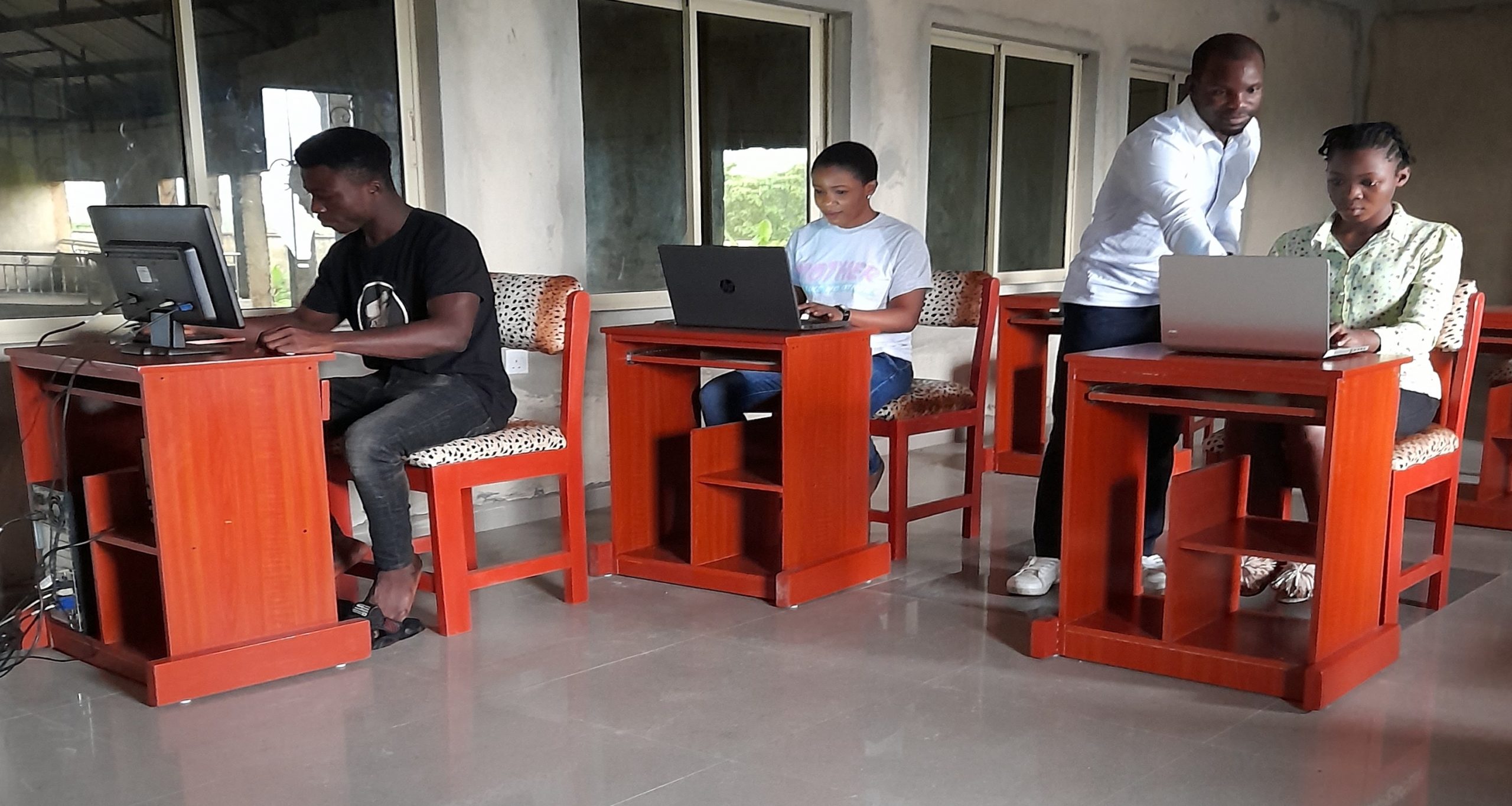 Students getting hands on experience of the working of the computer system and the parts